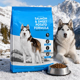 Nature Domain dog food bag beside a husky outdoors in snow